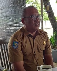 I Nyoman Dwitana, Sekretaris Dinas Tanaman Pangan Hortikultura dan Perkebunan Mimika. (Foto: Redaksi/Koranpapua.id)