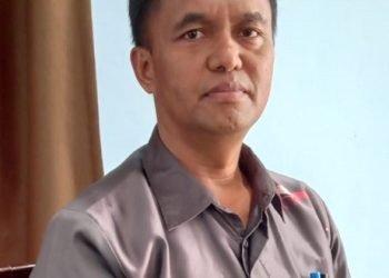 Petrus Pali Amba, Kepala Disperindag Mimika. (Foto : Redaksi/Koranpapua.id)