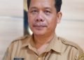 Yan Purba Selamat, Kepala Bakesbangpol Mimika. (Foto : Redaksi/Koranpapua.id)