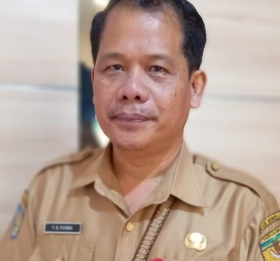 Yan Purba Selamat, Kepala Bakesbangpol Mimika. (Foto : Redaksi/Koranpapua.id)