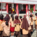 Bhabinkamtibmas Kampung Hangaitji Berikan Edukasi Kamtibmas dan Dasar Pramuka untuk Murid SD Timika II