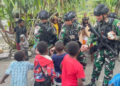 Hadirkan Senyum untuk Warga Papua, Satgas Yon Parako 466 Pasgat Pos Mulia Gelar Kegiatan Sosial