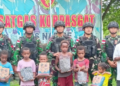 Perkuat Kedekatan dengan Masyarakat, Pasgat Nabire Salurkan Bantuan Sembako bagi Anak-anak Papua