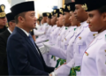 Dua Pelajar Asal Provinsi Papua Pegunungan Tampil Kibarkan Bendera di Istana Merdeka